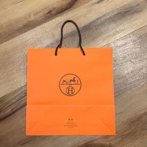 HERMES ORANGE BAG BROWN STRING 11 7/8 X 11 7/8 X 4.  GOOD CONDITION